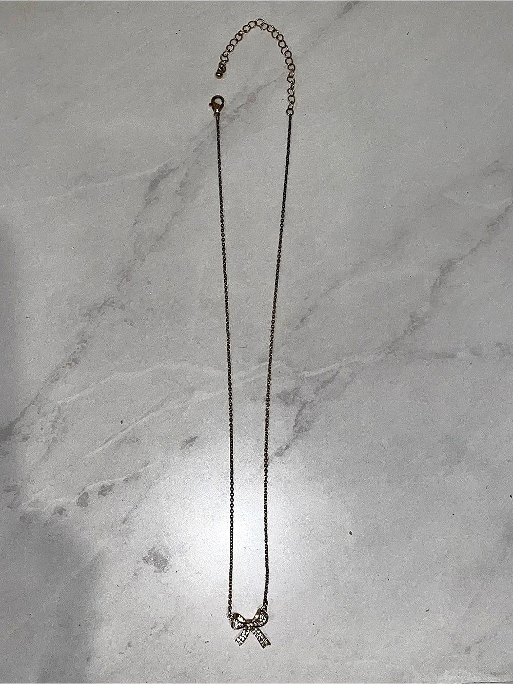 Bow Pendant Necklace in Gold